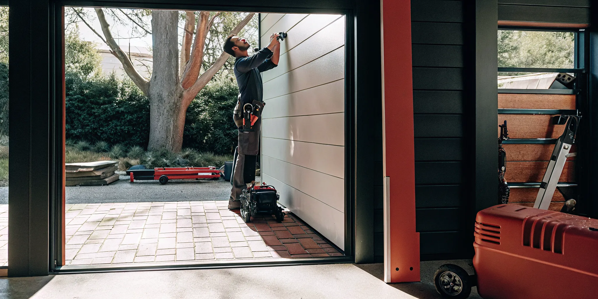 Professional electrician installing a home EV charging station in a Chicagoland garage